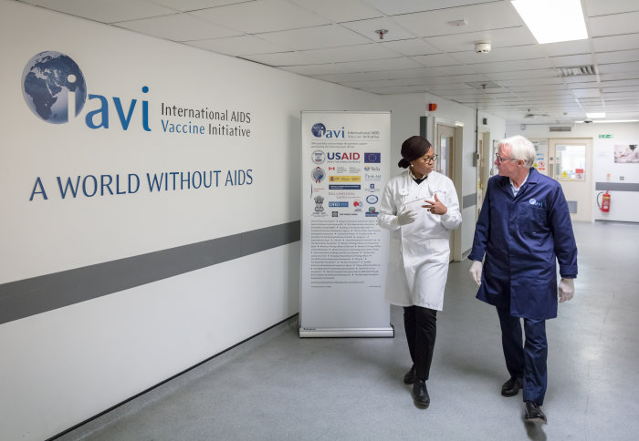 Norman Lamb walking with Dr Julia Makinde in the IAVI in Chelsea and Westminster Hospital