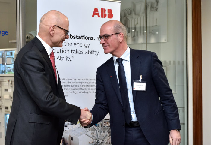 Professor Ian Walmsley and Claudio Facchin shaking hands after the ribbon cutting at the ABB-Imperial Smart Energy Demonstrator