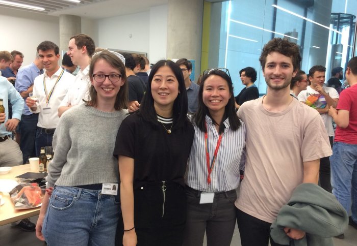 Tiffany Chan and other members of the Vilar group celebrating success at the PG symposium reception