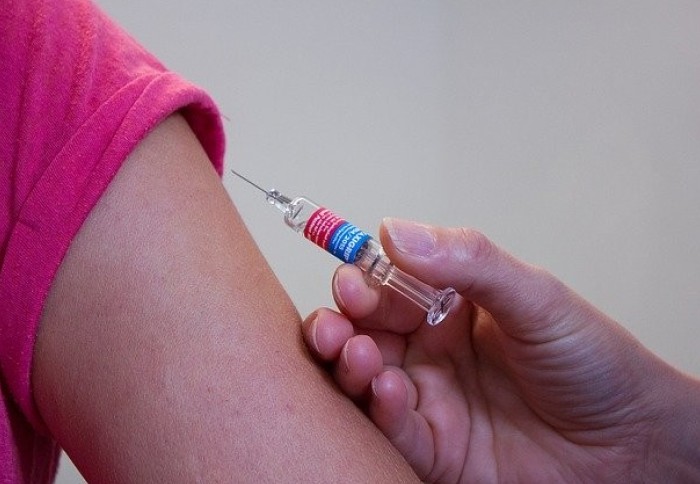 A person being vaccinated