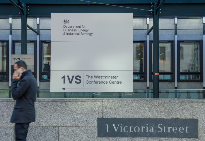 A man walks past the Department for Business, Energy and Industrial Strategy on 1 Victoria Street