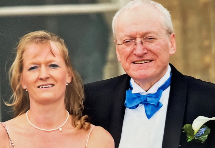 Former Head of Department Professor John Perkins and his wife Jenny Perkins smiling at the camera