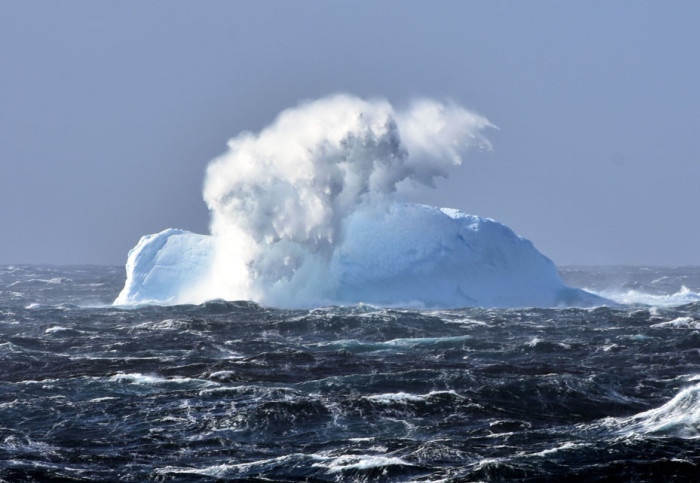 Wave breaking on an iceberg