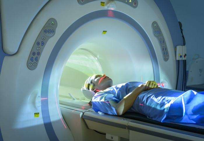 patient entering an MRI scanner