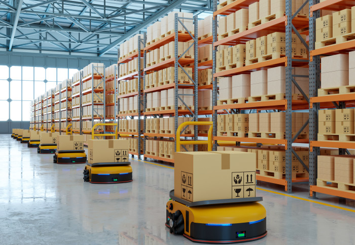 robots carry parcels in a warehouse