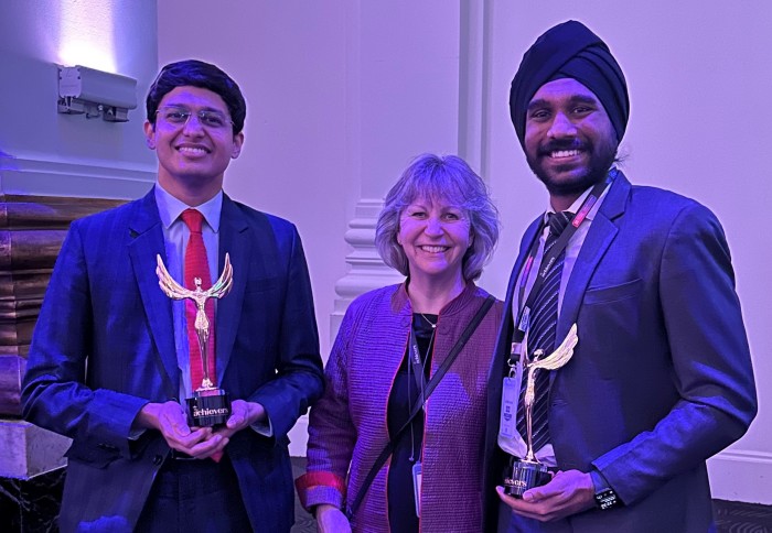 Honours winners, Vibin Joseph (left) and Karmanya Singh Sareen (right), with Professor Maggie Dallman