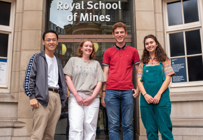 The four PhD students (Kosuke Ikeya, Becky Ryder, John Morley and Iona Anderson) standing outside the Royal School of Mines.