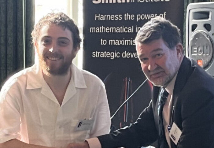 Kevin Michalewicz (Left) shaking the hand of the TakeAIM organiser.