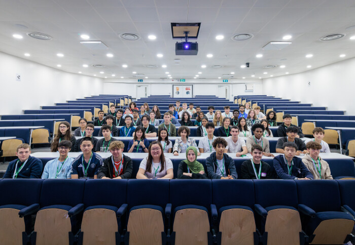 Group of Maths students gathered together in a student lecture hall