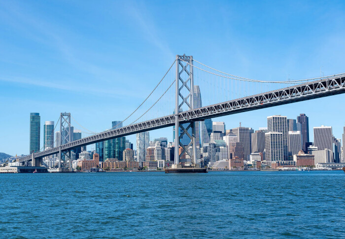 The Oakland Bay Bridge and downtown San Francisco skyline seen from the San Francisco Bay.