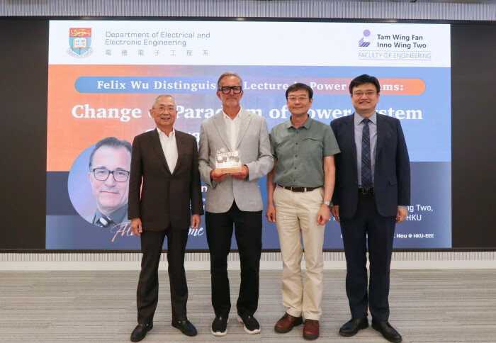 Professor Bialek with award for delivering the Felix Wu Distinguished Lecture