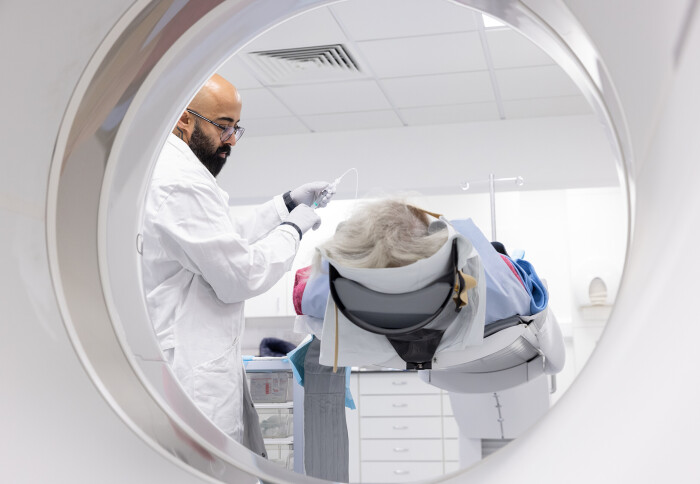 A person in a PET scanner.