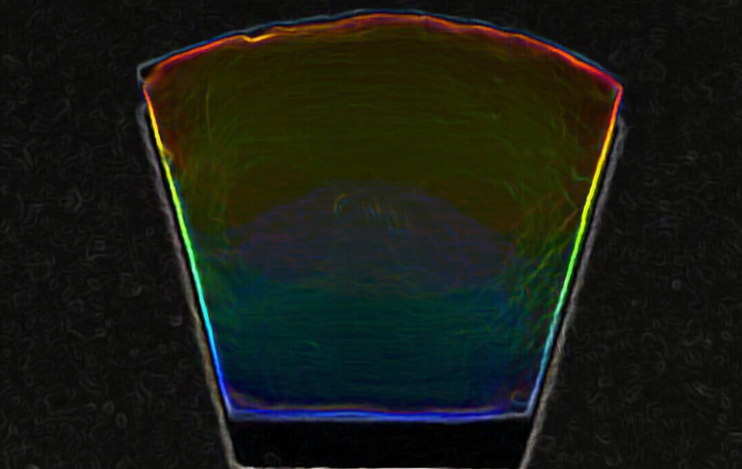 A trapezoidal coupon of polymer PDMS infused with carbon black when stretched along the altitude and exposed to plasma generates concentric wrinkles. This wrinkle geometry when shone with white light above and observed at an angle diffracts the white light and a rainbow spectrum is observed. The image was captured on an optical camera and a photo effect (glow edges on MS PPT) was applied