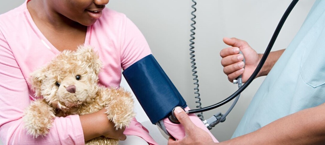 Child's blood pressure being taken