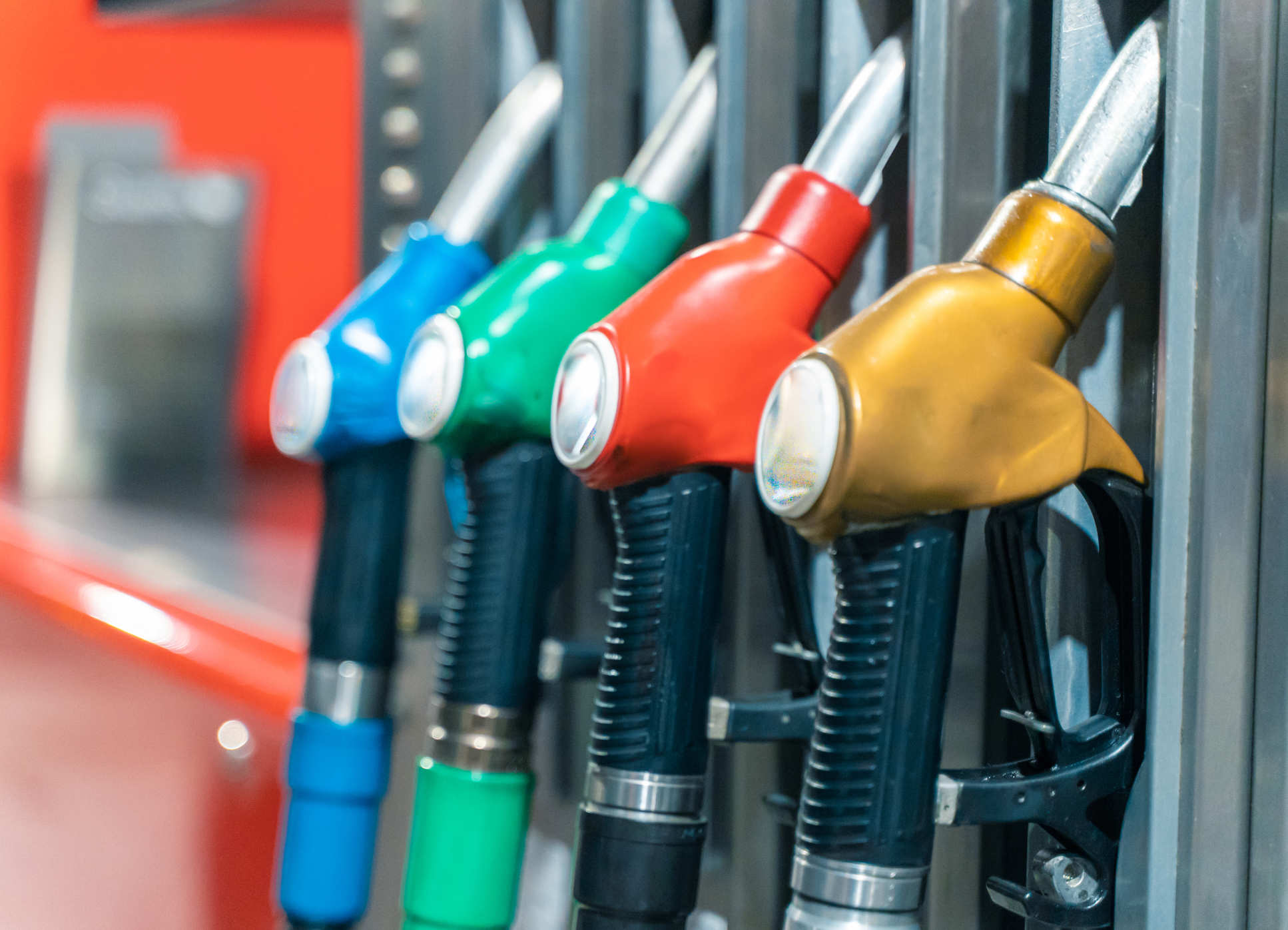 A closeup image of nozzles at a petrol pump