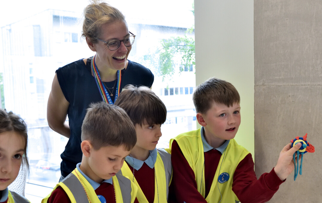 Student from St Bernadette's School makes a model virus from playdoh