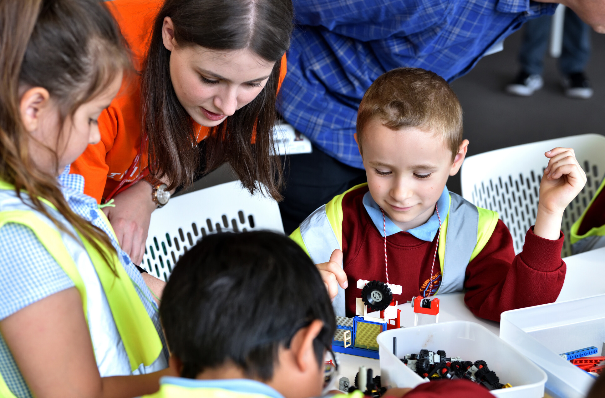 Shira working with young people using lego 