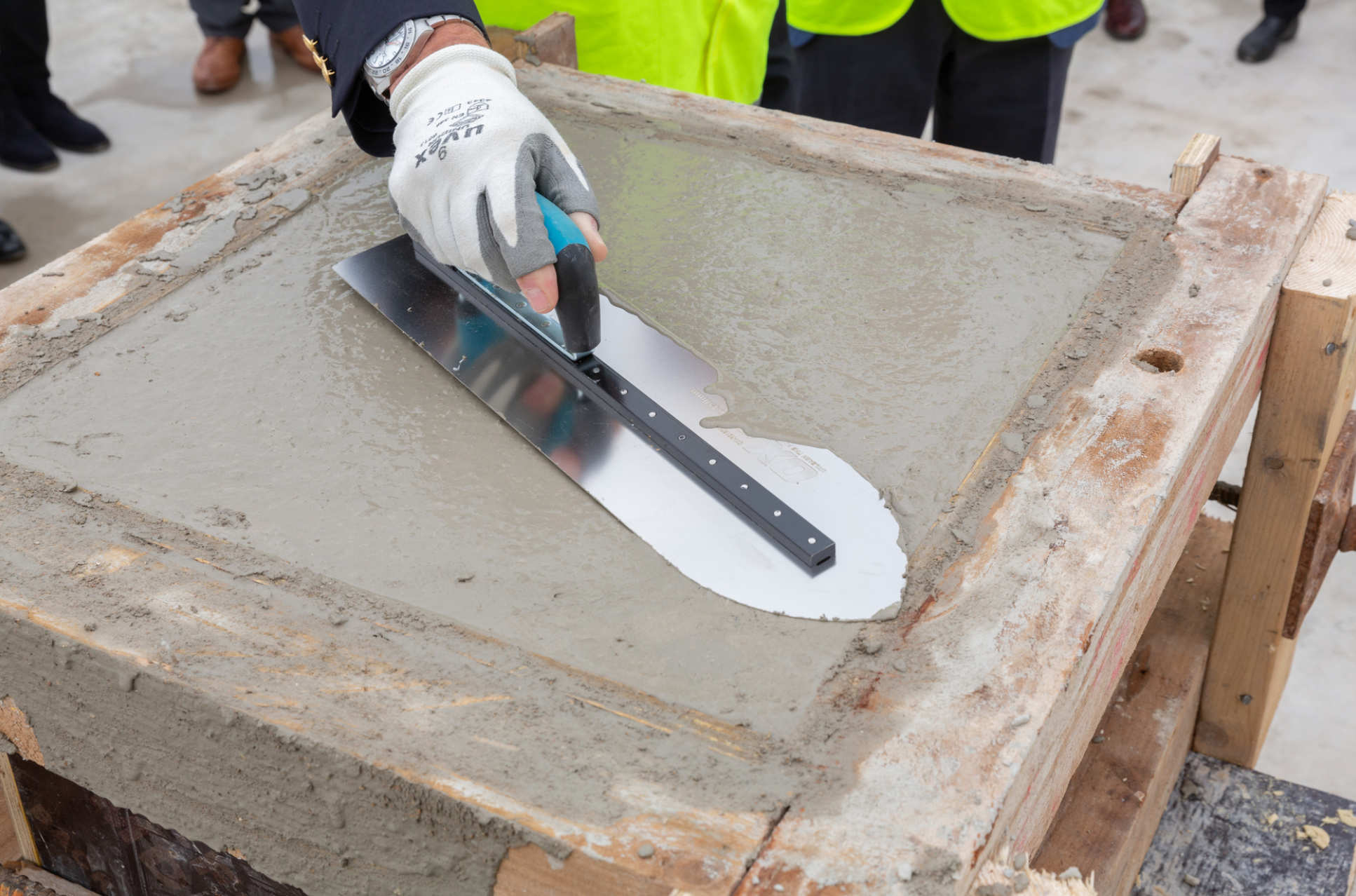 Trowel smoothing out concrete