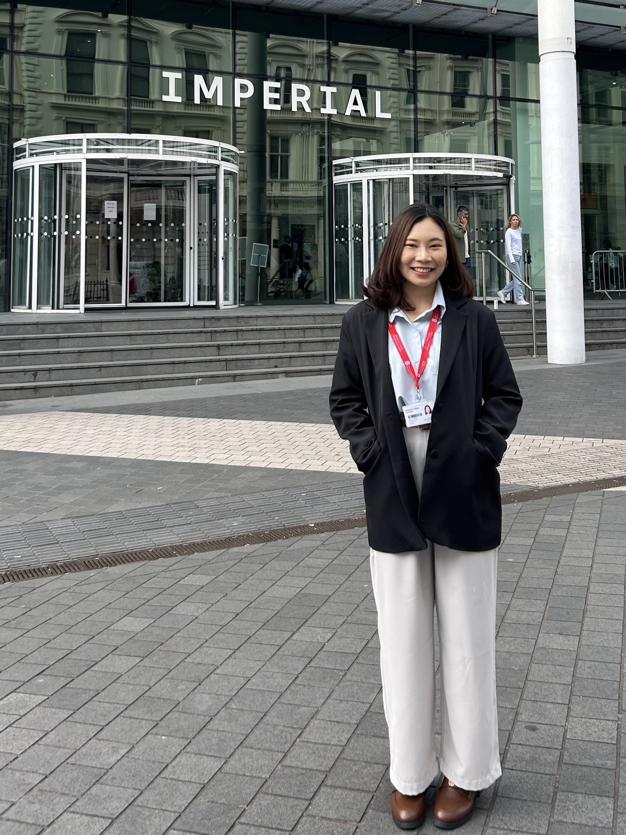 Rose standing outside the main entrance of South Kensington Campus