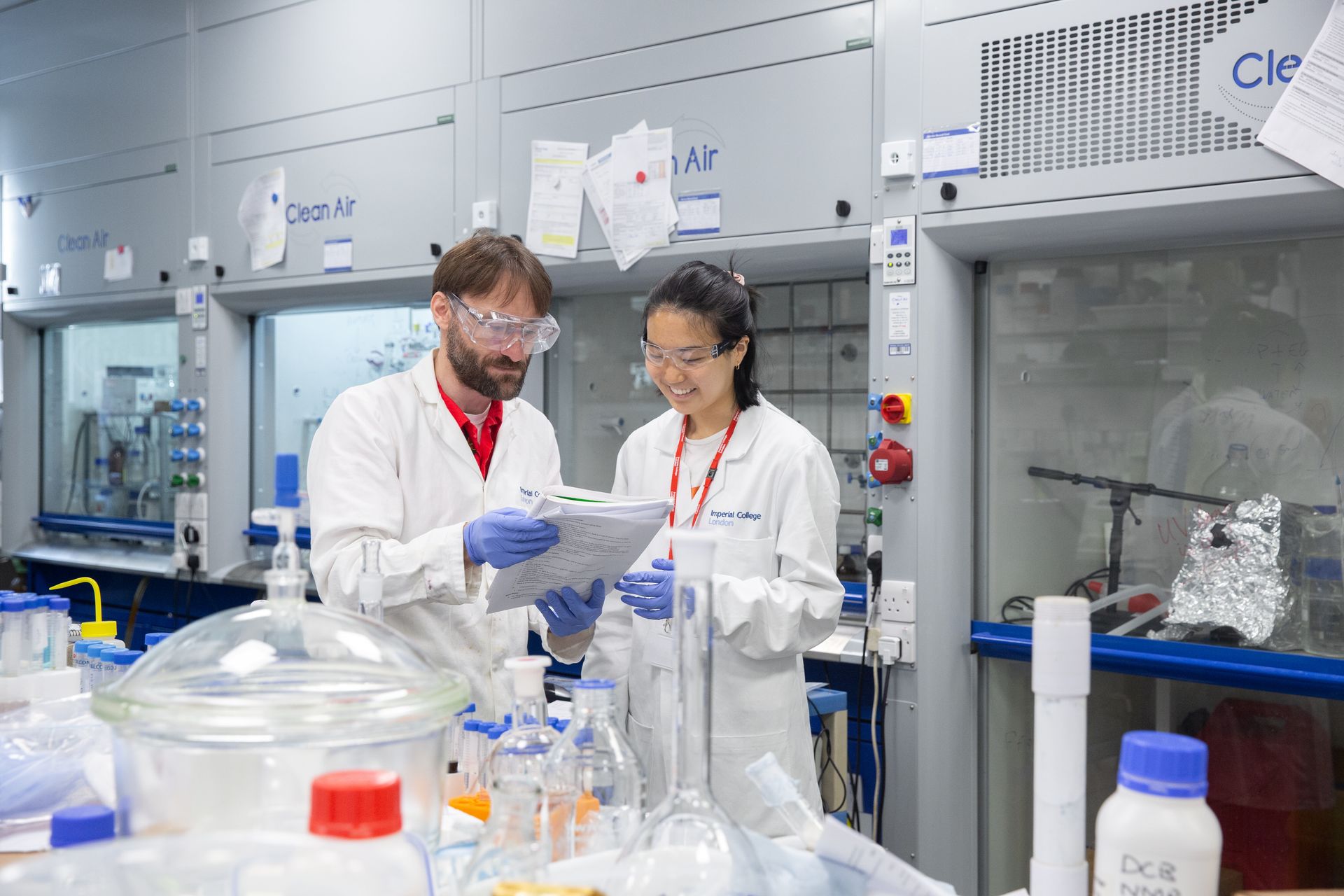 Two students talking in a laboratory