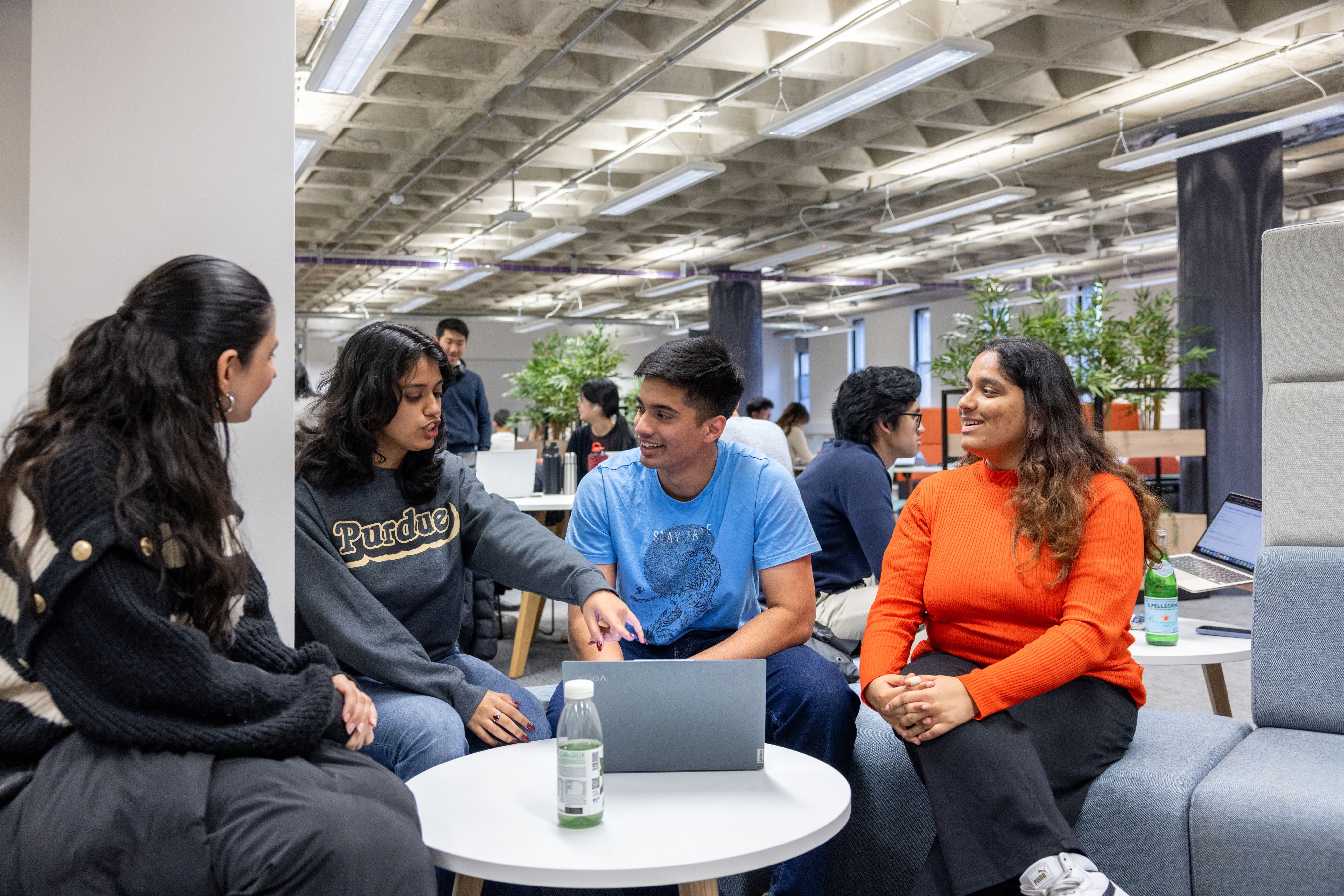 A group of students working in a recently refurbished area of the library