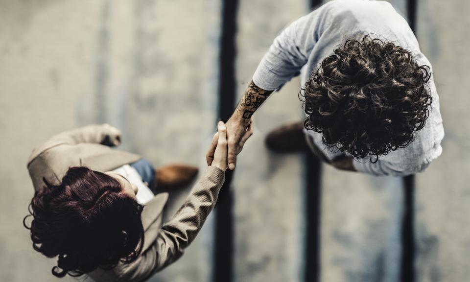 Two people shaking hands