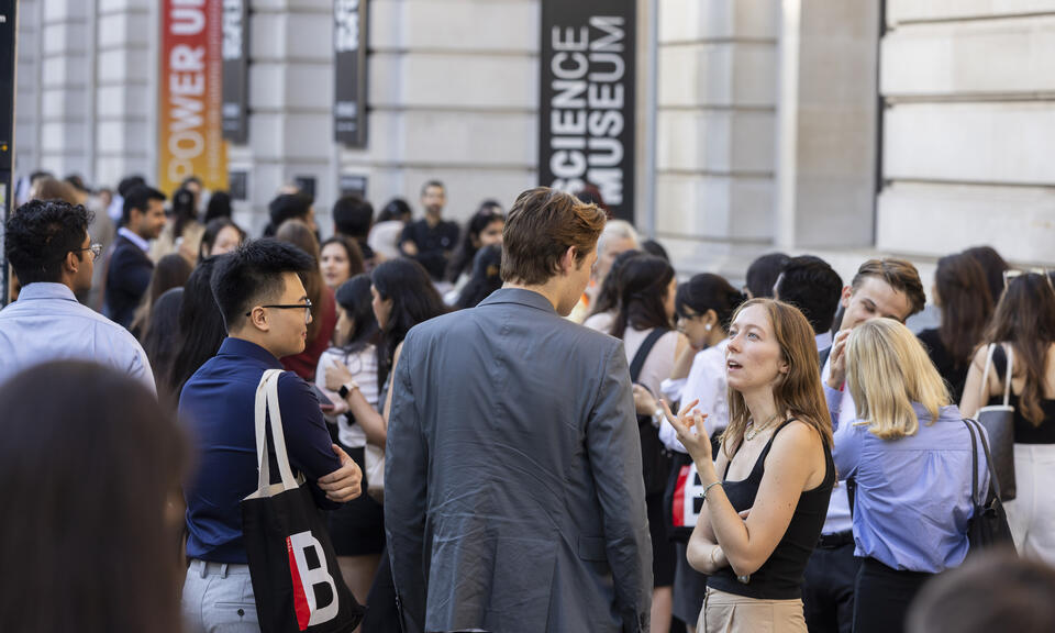 Students networking outside the Science Museum