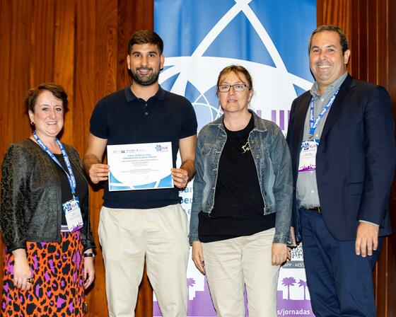 Dr Mario Martinez-Jimenez being presented with the best public health conference paper award at the Spanish Health Economic Association conference June 2024