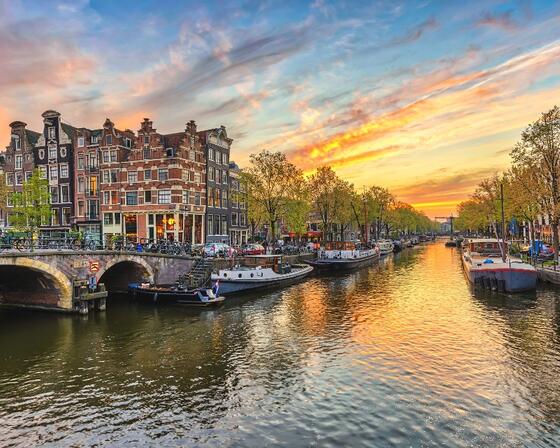 The city of Amsterdam, Netherlands in the evening