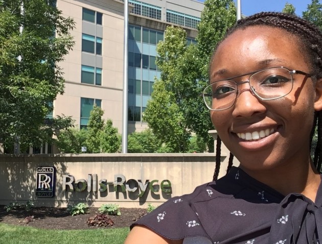 Abigael pictured outside Rolls Royce