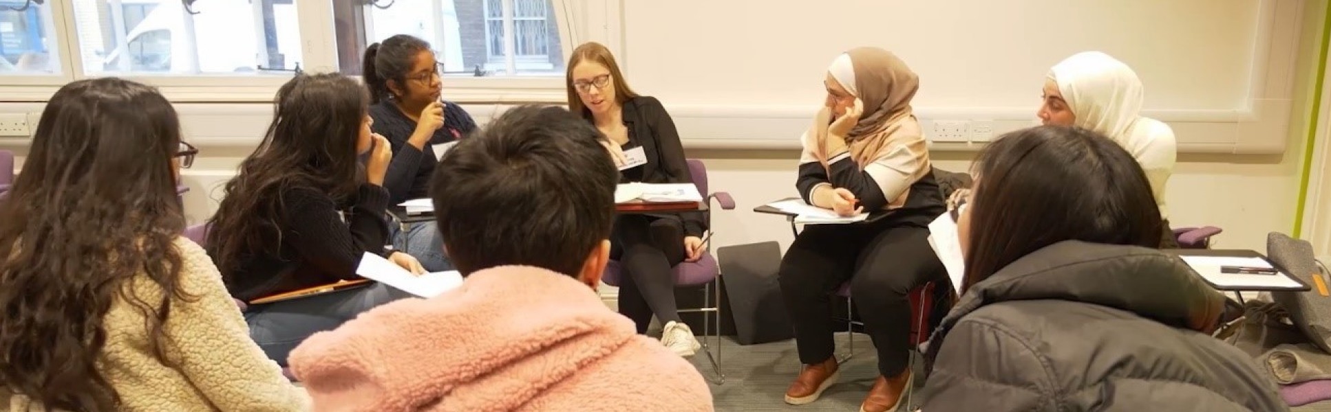 A group of students taking part in a discussion