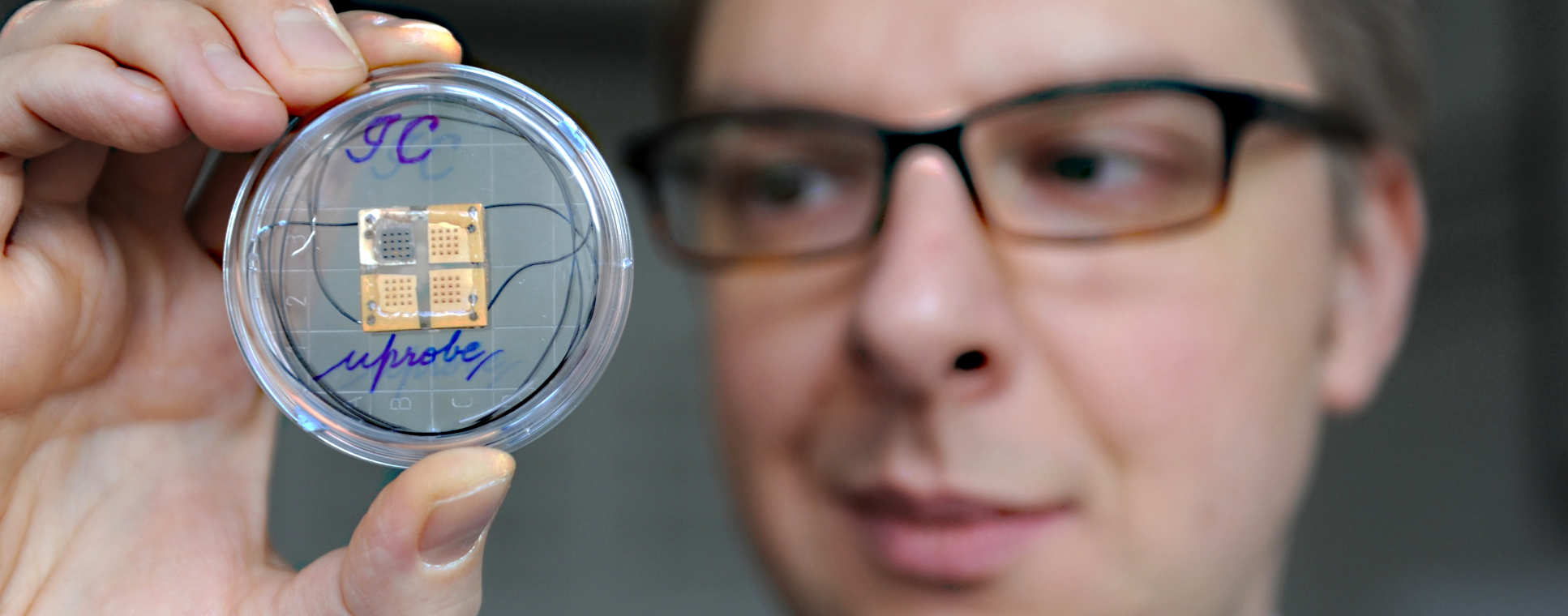 Professor Nick Oliver examining a protoype in the laboratory