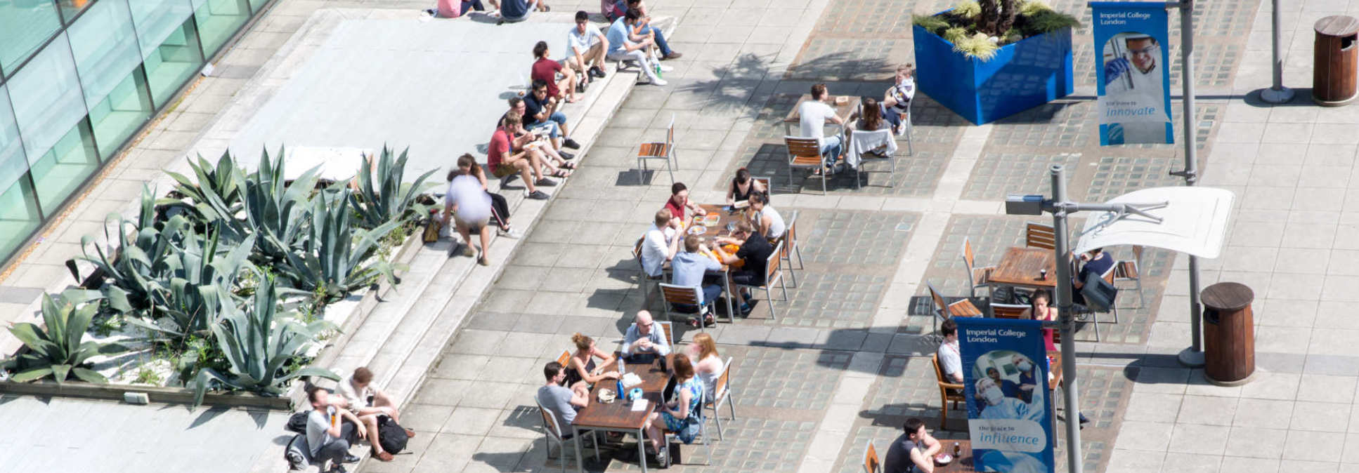 Image of people relaxing on Dalby Court at Imperial College London