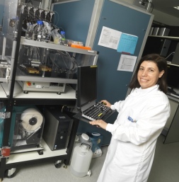 Dr Moraes stands in front of the crystal incubator