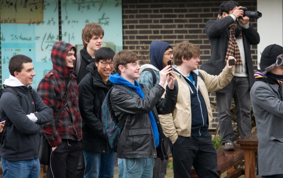 Large groups attended to cheer on and photograph their friends' flight