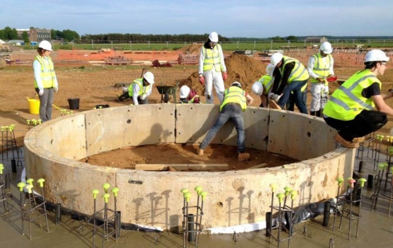 Industry professionals volunteer their time to assist at Constructionarium