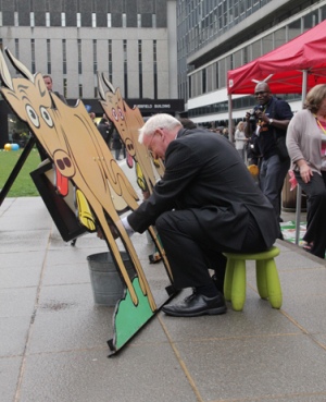 Imperial's Provost Professor James Stirling taking part in one of the games put on as part of Imperial's Village Fete