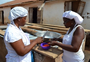 Caterers prepare children's meals in Ghana