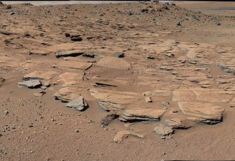 Curiosity rover's MastCam showing sandstone beds inclined towards Mt Sharp, Mars