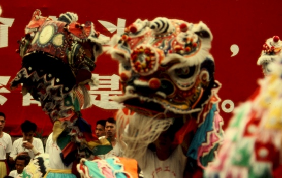 Guangzhou – May Day Festival – lion dance, close up of performers, 1976