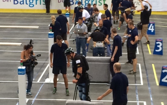 On the other side of the arena teams rehearse the exoskeleton challenge
