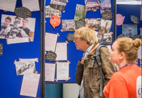 Alumni and volunteers browse the Our Imperial display