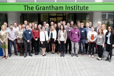 Jeremy Grantham poses with staff and students in front of the Institute