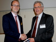 Craig Magee recieves the Murchison fund from Prof. David Manning