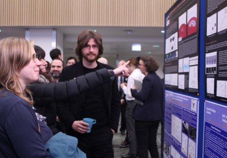 Guests at the poster exhibition