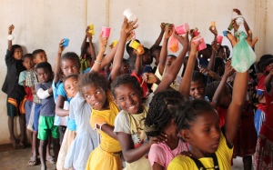 Children cheering after receiving medicine
