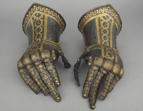 A pair of ornate 16th century gauntlets