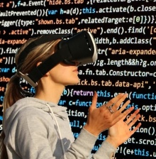 Woman wearing cyber glasses looking at streams of data