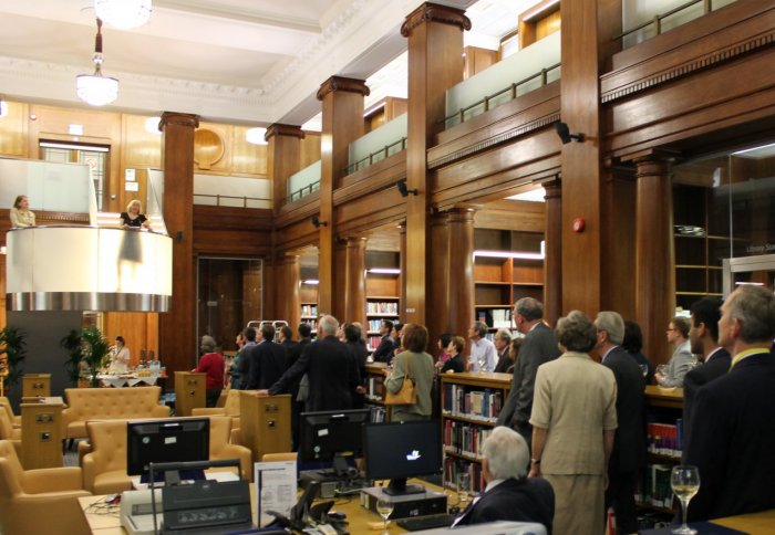 Guests gather at the official reopening of the Fleming Library