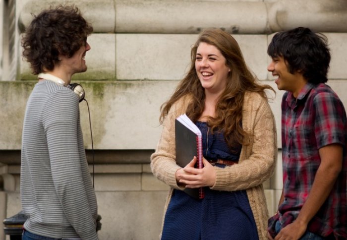 Students talking on campus. Maybe they're talking about a recent careers event.